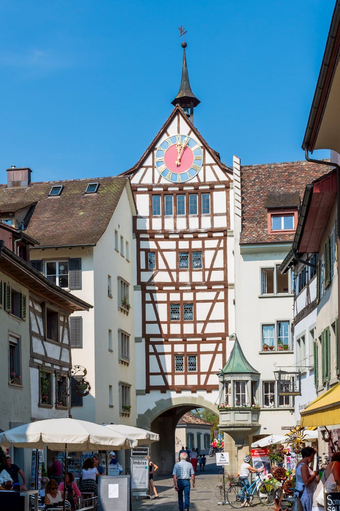 about-img Explore the picturesque clock tower and timbered buildings of Stein am Rhein, a Swiss medieval gem.